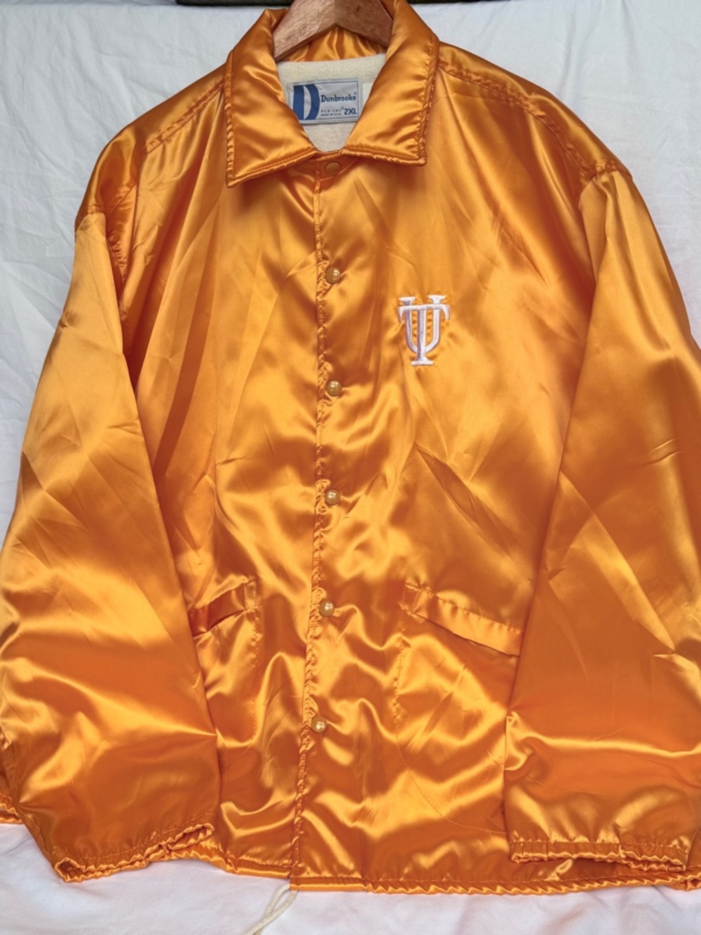 Dunbrooke Satin Coach Jacket in Bright Orange with White Embroidered Logo